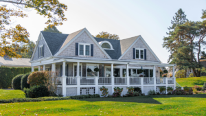 Gray wooden house with white porch