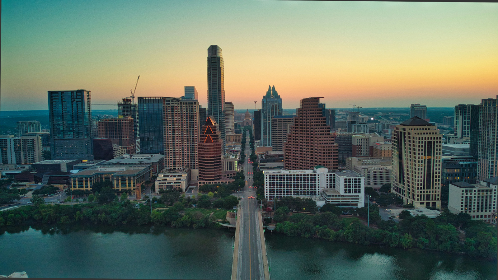 Sun rising over downtown Austin, TX, south of the Colorado River