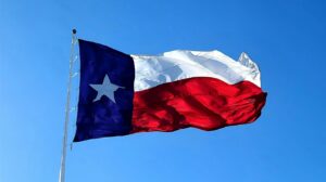 A Texas flag being flown after the user understands the Texas Property Tax Appeal Process