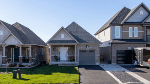 A row of small brick homes in a quiet neighborhood