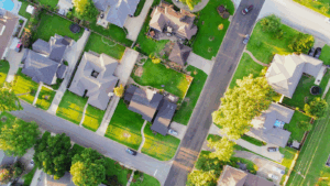 Aerial drone-shot view of a bustling suburban neighborhood