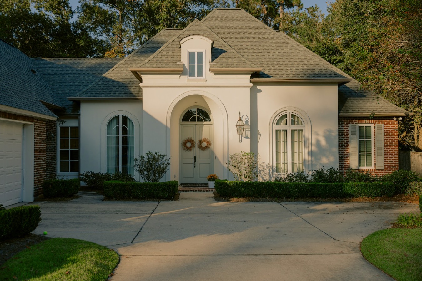 A white home in Texas where the homeowners have read the blog "How Property Valuations Affect Your Texas Property Taxes"