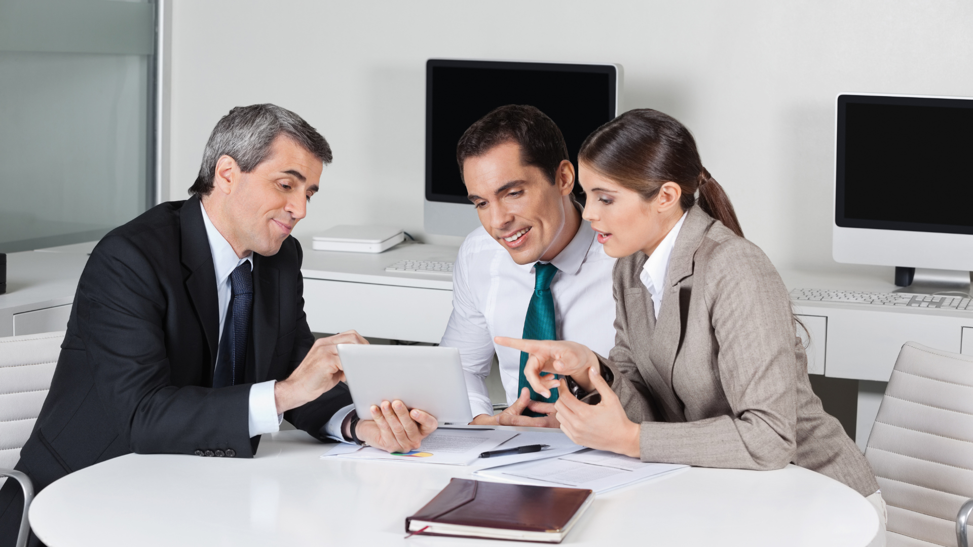 Texas tax consultant discussing property tax reduction with clients